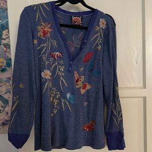 Johnny was long sleeve, half button size large